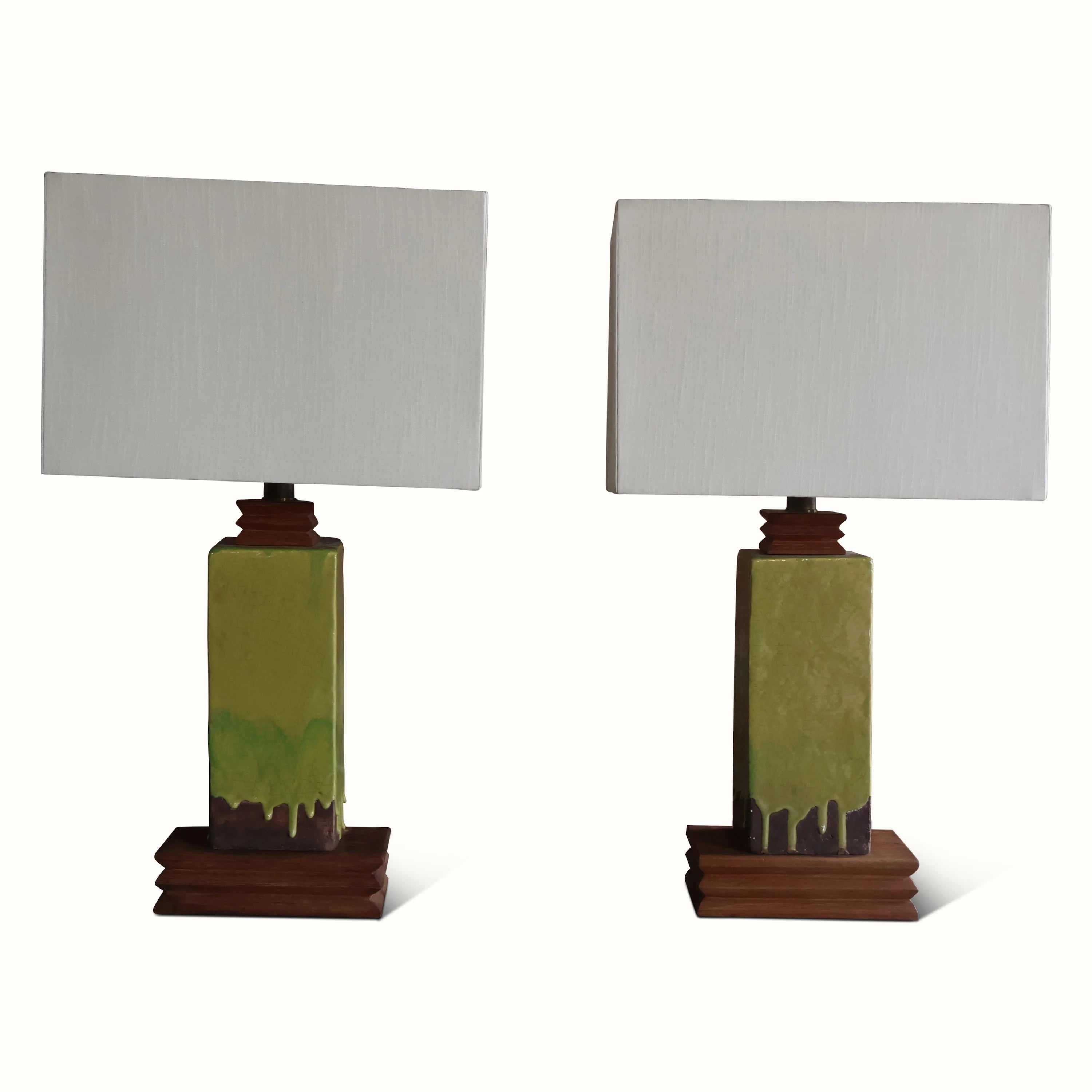 A Pair Of Ceramic And Walnut Lamps